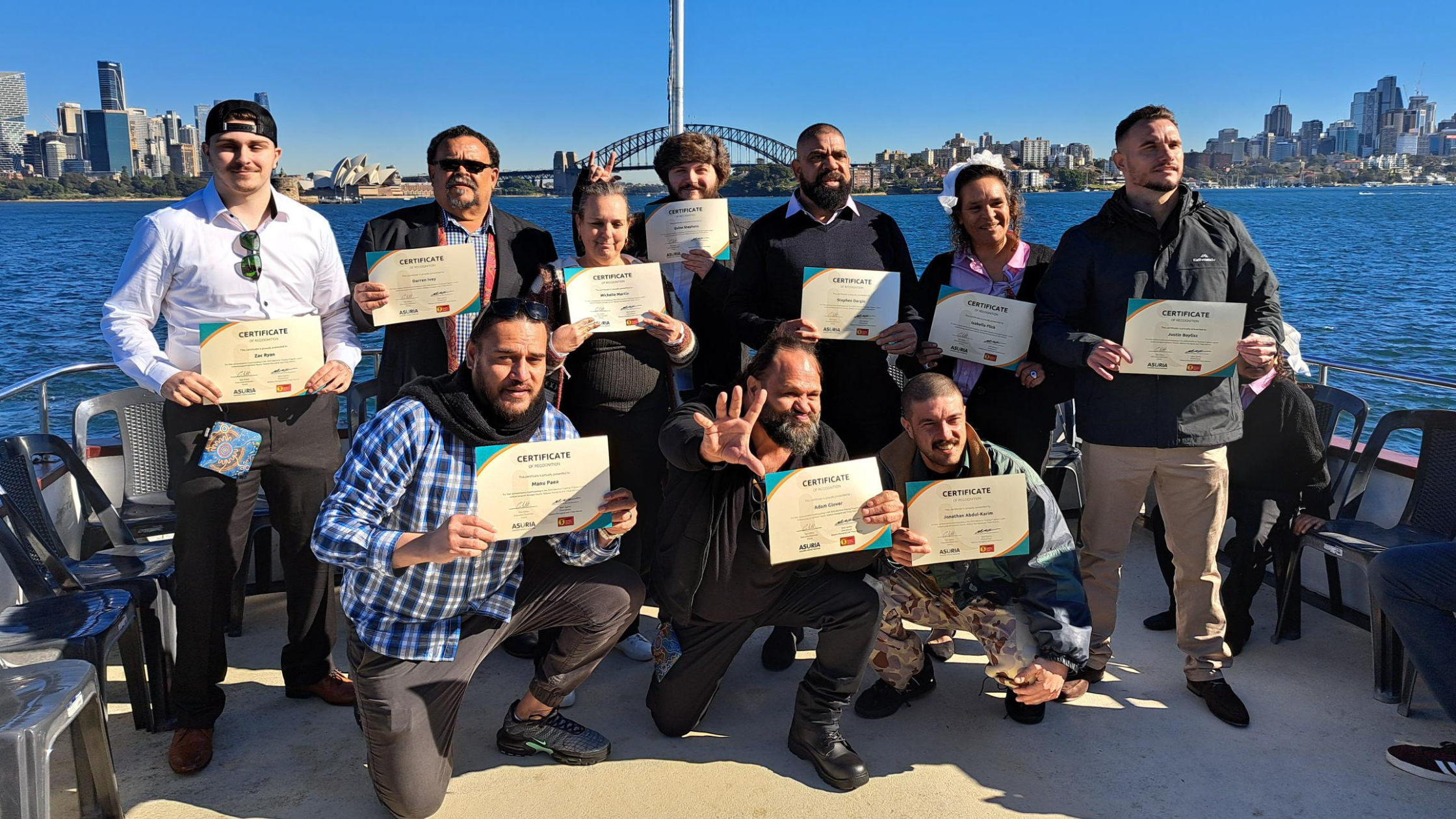 2024 Maritime operations program graduates smiling with certificates